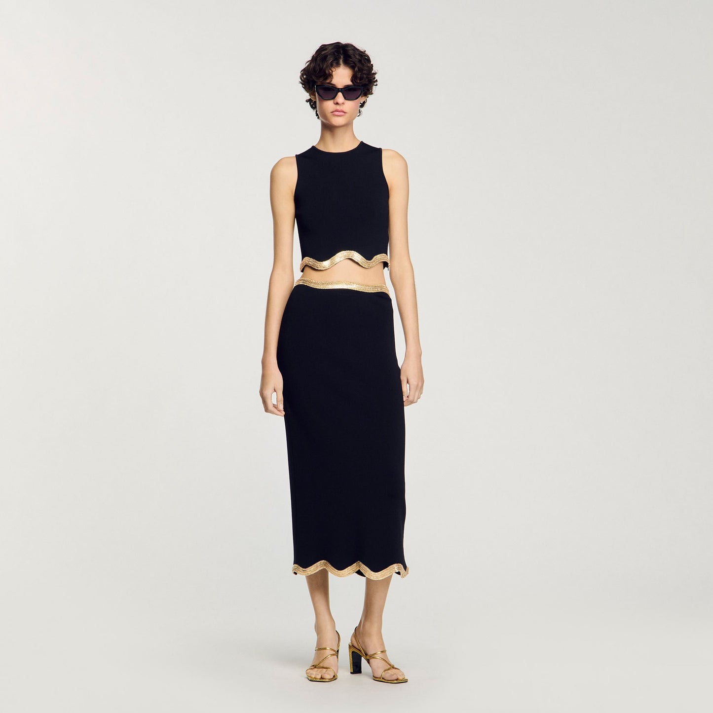 Black Long Knitted Skirt With Chain Detail