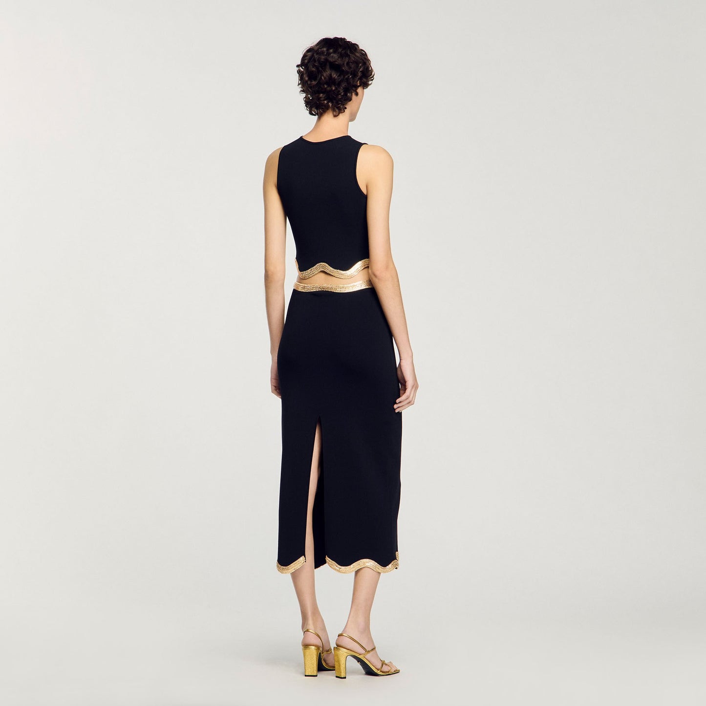 Black Long Knitted Skirt With Chain Detail