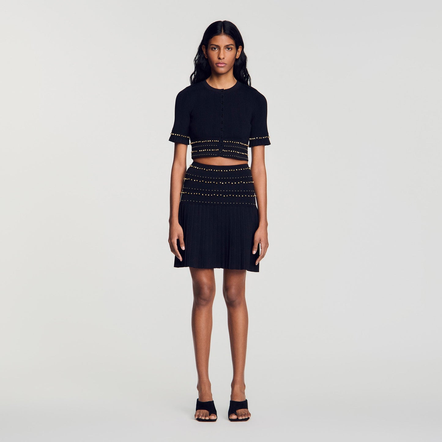 Loria Short skirt with tassels Black
